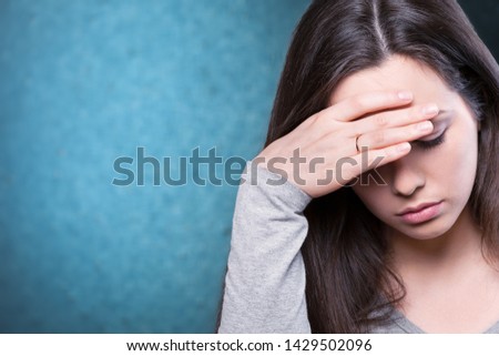 Young woman having a headache