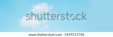 web banner spring and summer season with beauty clear and bright sky and cloudy background with copy space