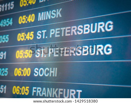 Electronic scoreboard flights and airlines. Destinations: Simferopol, Bahrain, Minsk, St.Petersburg, Sochi, Frankfurt, Vienna. Airport flight information arrival displayed on departure board, flight
