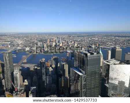 Photo of manhattan with brooklyn in background, taken from one world trade center