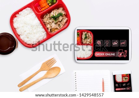 Food delivery service or order food online by motorcycle at home and icon media symbol on touch screen. Business and technology for shopping online with lifestyle in city concept.