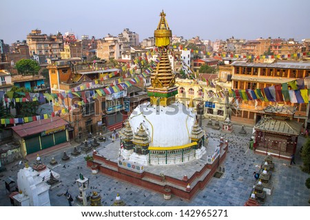 Kathesimbu Stupa with Buddha wisdom eyes and prayer colorful flags in Kathmandu, Nepal Royalty-Free Stock Photo #142965271