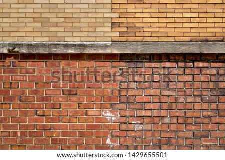 Exterior Wall with Four Different Types of Bricks and a Concrete Ledge Royalty-Free Stock Photo #1429655501