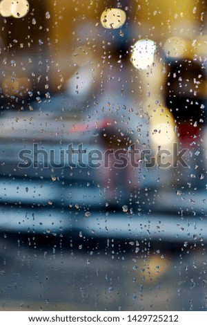 Raindrops on glass window pane