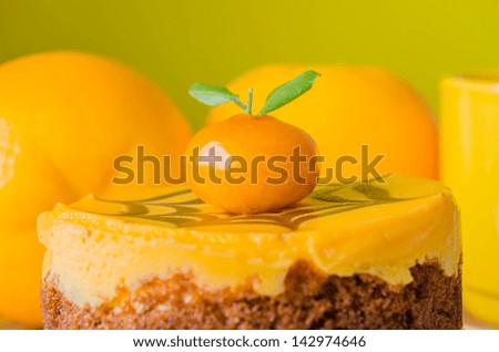 Orange Cake in white dish on the wood table