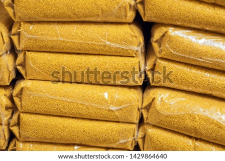 millet bags packing background sale cereals agro-industry