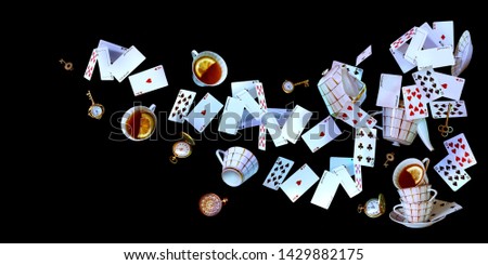 Wonderland background. Mad tea party.Playing cards, pocket watch, key, cup and teapot falling down on black background. Horizontal banner. Royalty-Free Stock Photo #1429882175
