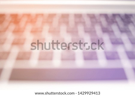 Blurry image of key pad on keyboard of modern laptop computer