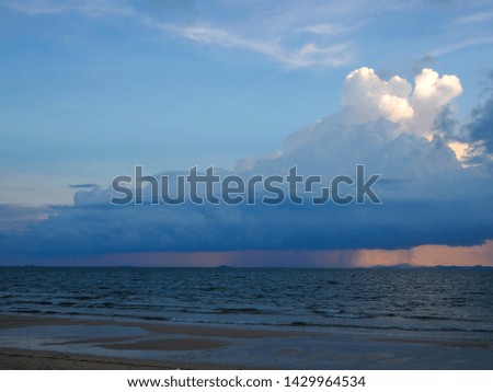 Raining clouds in the sea , Koh Yao , Thailand