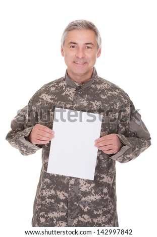 Mature Soldier Holding Blank Paper Isolated On White Background
