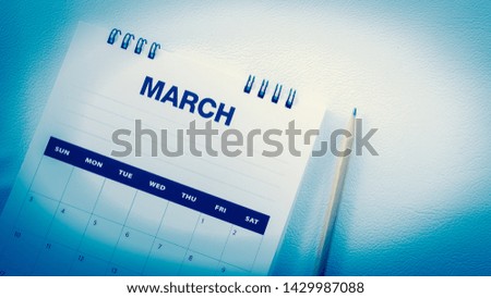 Close up white calendar page in planning concept in blue tone.