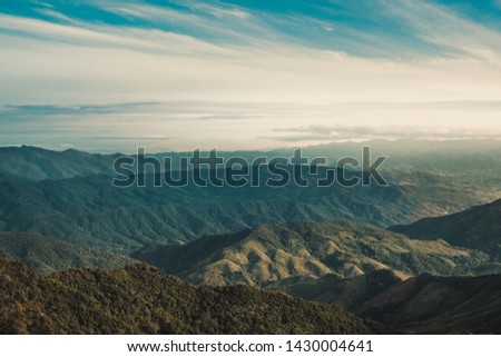 The green mountain view with blue sky of Nan, Thailand