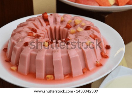 close up photo food dessert jelly cake.  Image pieces of jelly cake on white plate