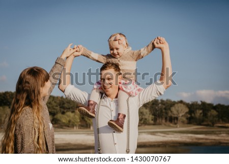 Young family with children having fun outdoor - Image 