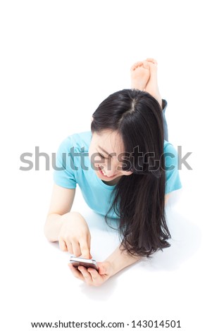 beautiful girl lying on the floor with smart phone, isolated on white background