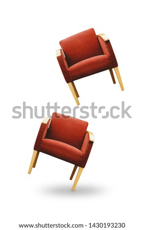 Red armchair isolated on white.