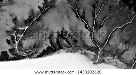 winter storm, allegory, abstract naturalism, Black and white photo, abstract photography of landscapes of the deserts of Africa from the air, aerial view, contemporary photographic art, 