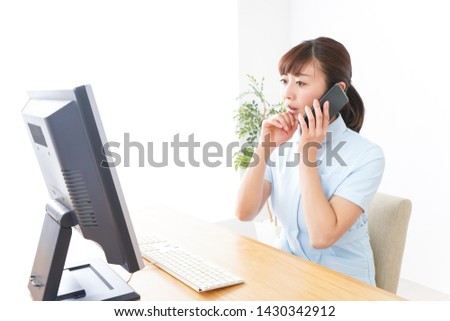 Young nurse working at Office