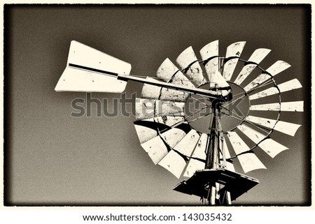 Grunge image of an old windmill