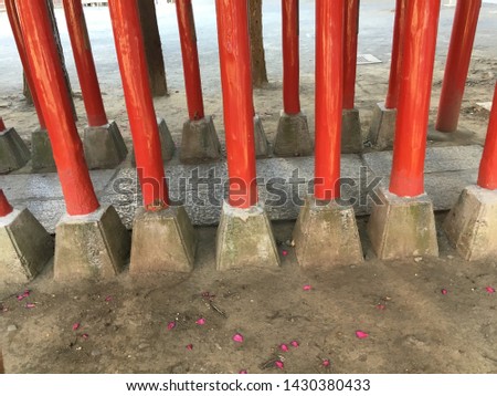 Image of the foot of the torii of a shrine in Shinjuku, Tokyo, Japan