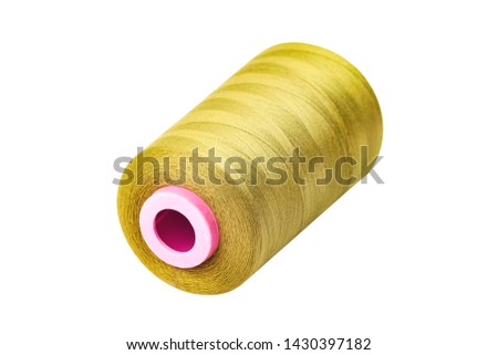 One twisted cylindrical new clean bobbin full of yellow synthetic threads isolated on white background without shadow Royalty-Free Stock Photo #1430397182