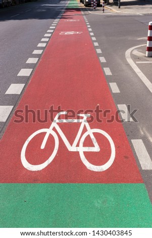 Specially designated bicycle lane in the Kreuzberg district of Berlin, Germany. Urban infrastructure for green sustainable transportation Vertical view.