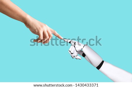 Human hand and robot hand system concept integration and coordination of artificial intelligence technology Royalty-Free Stock Photo #1430433371