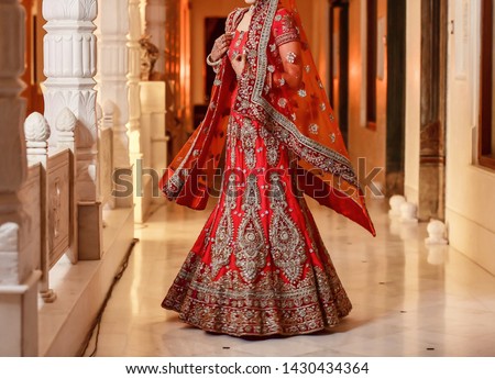 Pakistani Indian bridal ceremony lehenga outfit Royalty-Free Stock Photo #1430434364