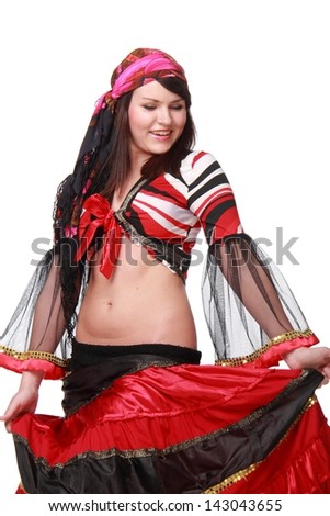 Pretty young woman in a beautiful fancy dress on white background