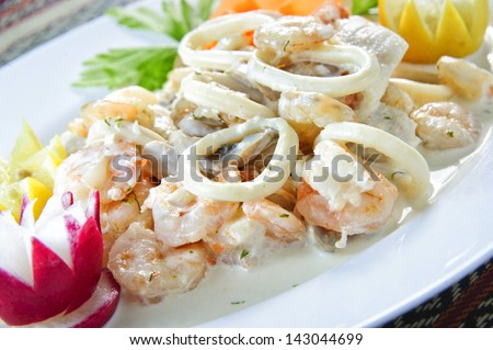 Picture of tasty cooked sea food plate.