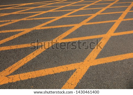 Yellow No Parking Line on Tar Highway