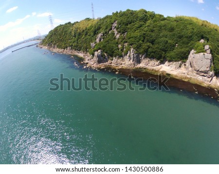 Aerial view by the sea on a sunny day