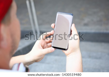 Smartphone hand hold. Electronic wireless device concept. Copy space background. Mobile phone. Social media network concept.