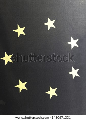 Circle of seven white stars