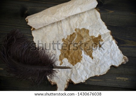 map of switzerland on vintage paper with old pen on the wooden texture desk background
