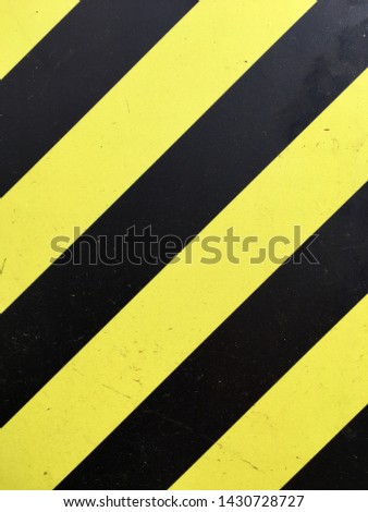 yellow black stripes background surface