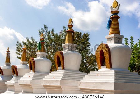 View at the stupas at Thrangu Tashi Yangtse Monastery complex called Namo Buddha monastery in Nepal. Build at the place where the prince gave his body to hungry tiger. Royalty-Free Stock Photo #1430736146
