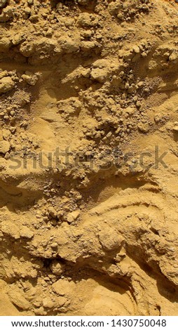 texture and background of a large pile of building sand in the summer