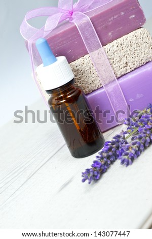 bottle of lavender oil, bunch of lavender flowers, soap  