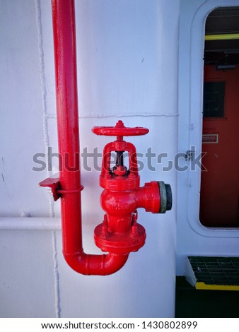 fire hydrant valve on deck painting with red color sign as emergency and also for easy to remember valve location