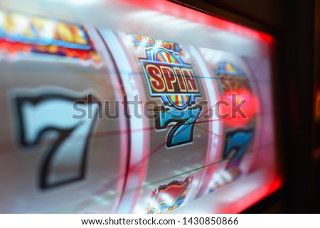 Close up on slot machine display. Slot machine drums. Royalty-Free Stock Photo #1430850866