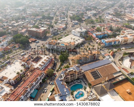 Aerial photos of the beautiful town of Puerto Vallarta in Mexico, the town is on the Pacific coast in the state known as Jalisco, showing hotels, homes and local businesses  and roads with traffic