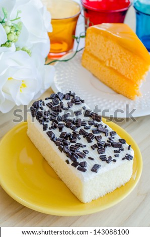 Vanilla Cake in white dish on the wood table