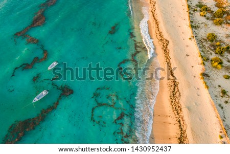 Anakao beach, South West Madagascar. Aerial photo of the coastline with boats on anchor Royalty-Free Stock Photo #1430952437