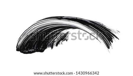 Black smear of mascara or acrylic paint isolated on a white background Royalty-Free Stock Photo #1430966342