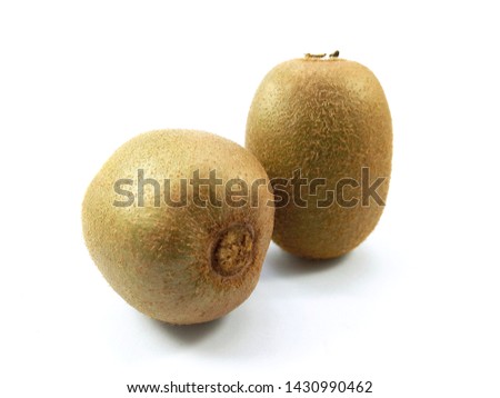 two kiwi fruits stock photo isolated on white background