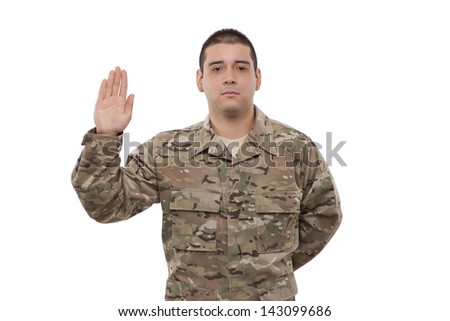Soldier raising hand and performing oath 