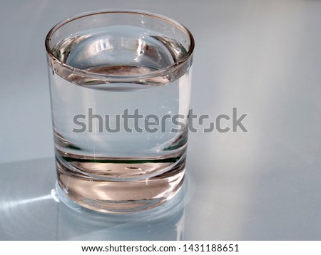 A glass of clean drinking water. In the world There is not enough fresh water