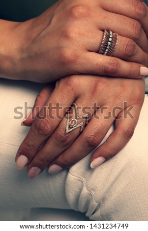 beautiful woman with ring on finger