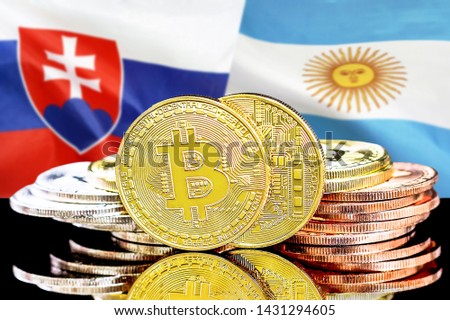 Concept for investors in cryptocurrency and Blockchain technology in the Slovakia and Argentina. Bitcoins on the background of the flag Slovakia and Argentina.